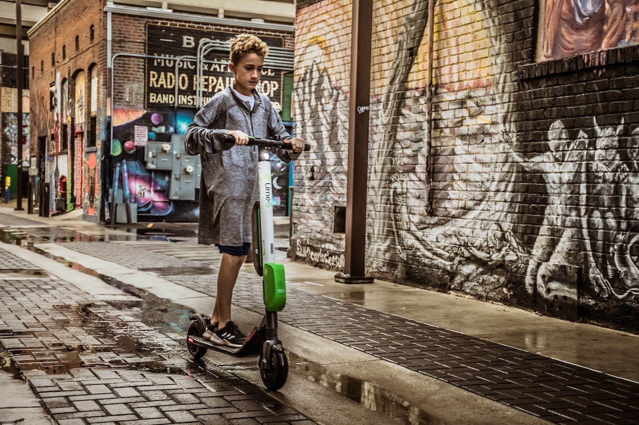 A child on an e scooter