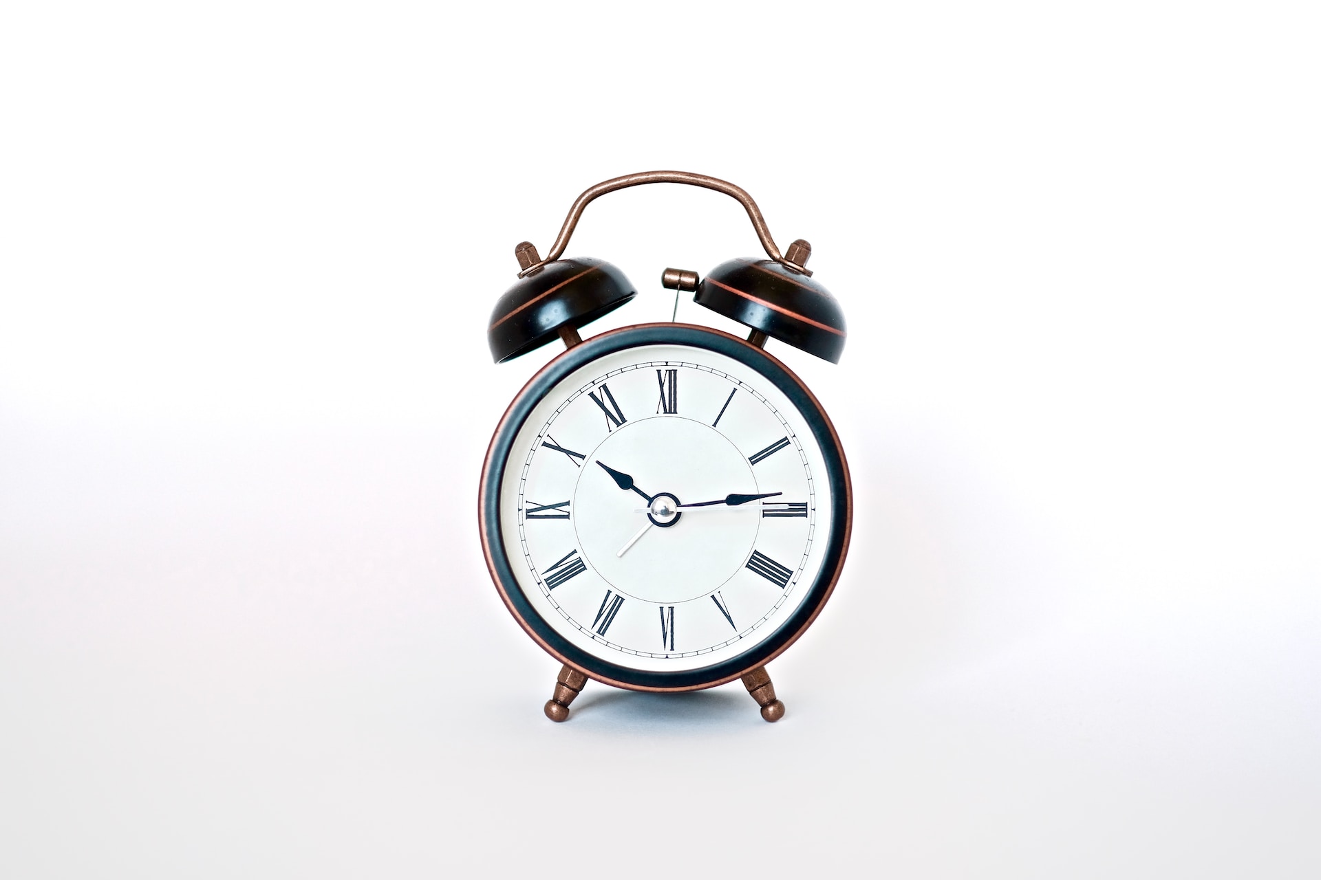 An alarm clock showing 10:15