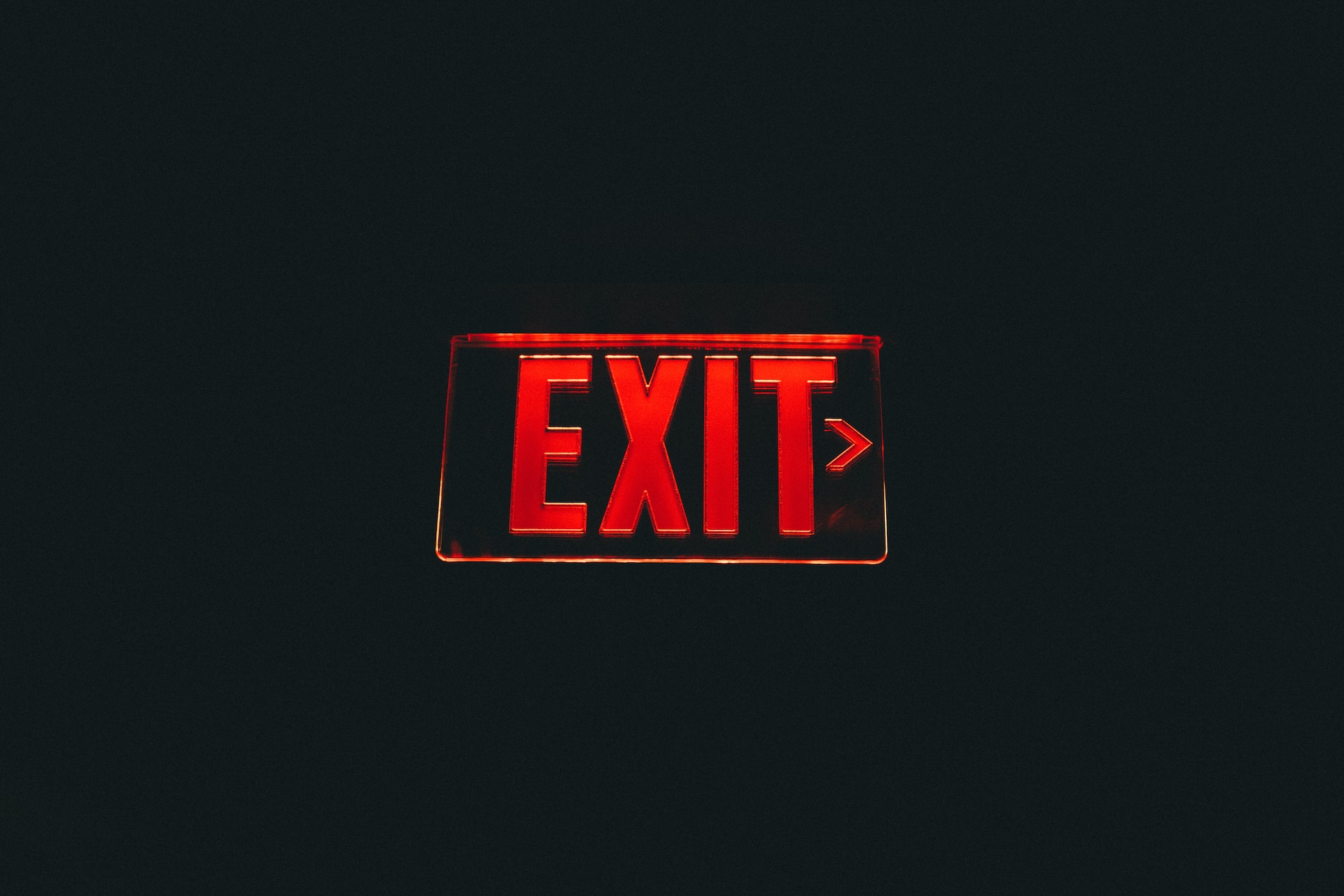 A red fire exit sign