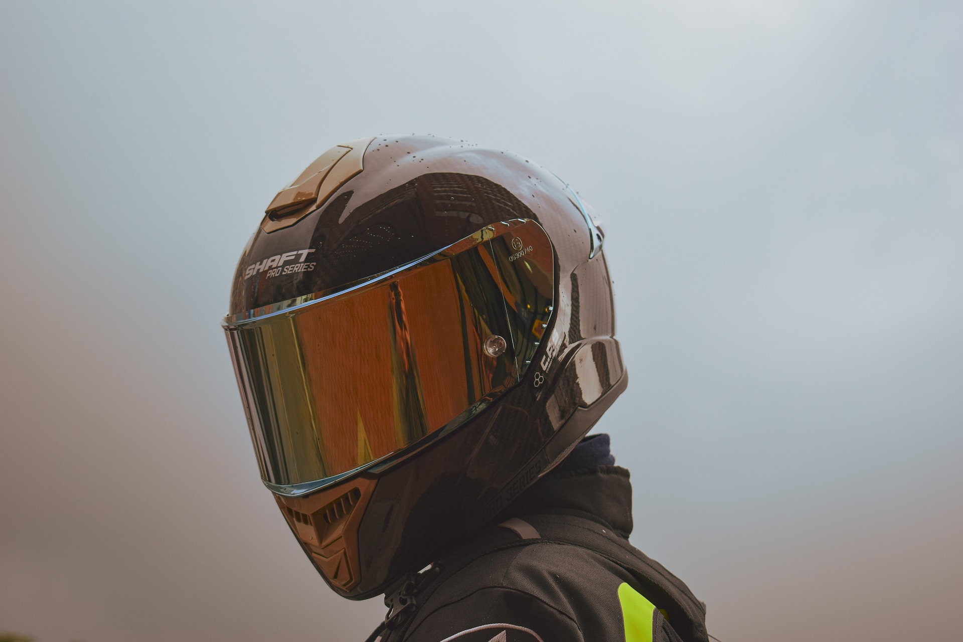 Someone wearing a motorbike helmet