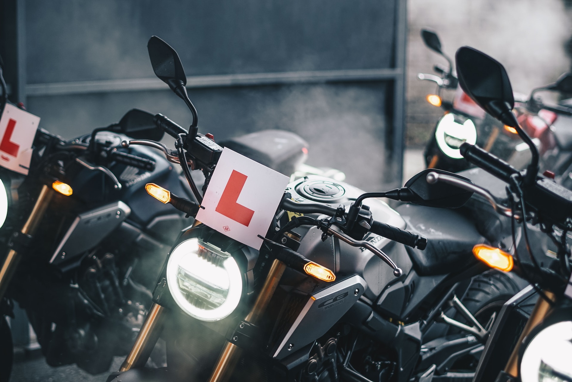 A  motorbike with an 'L' sign on the front