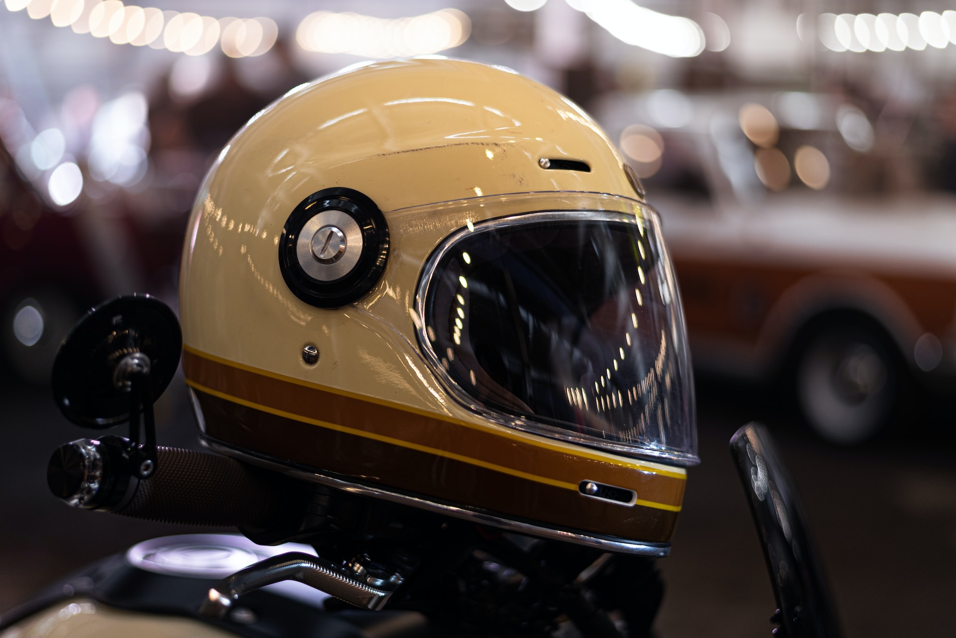 A motorbike helmet resting on a motorbike