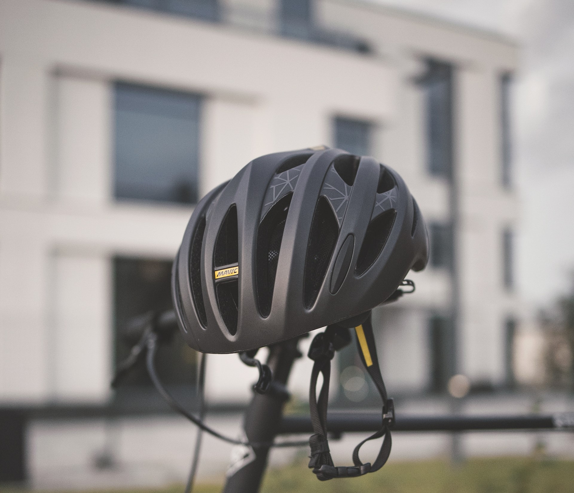 cycling helmet resting on handlebars