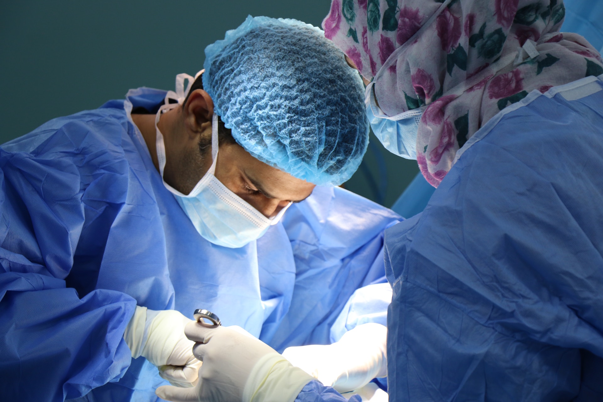 Two surgeons operating