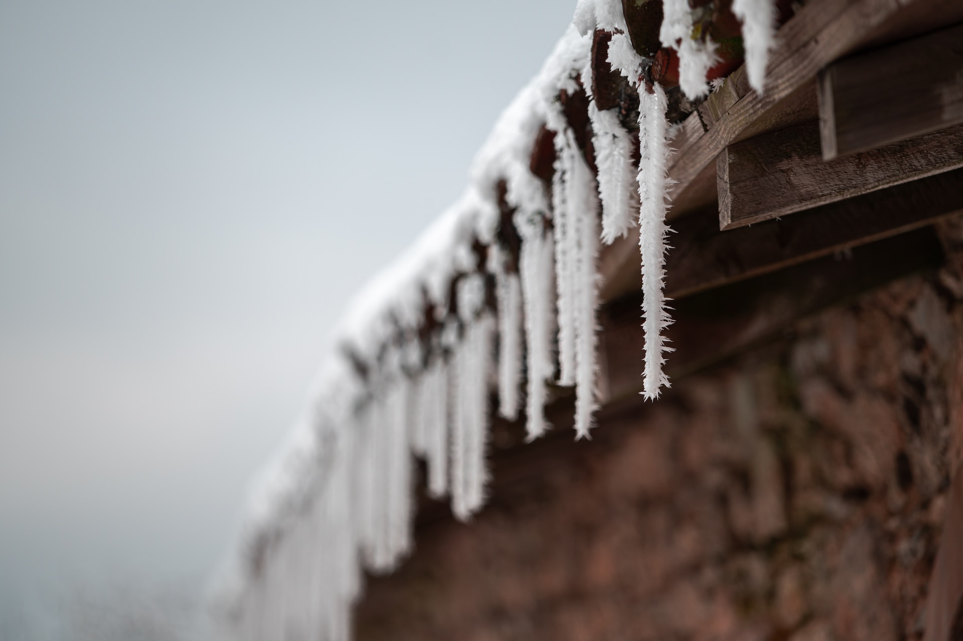 Icicles forming on the edge of a roof