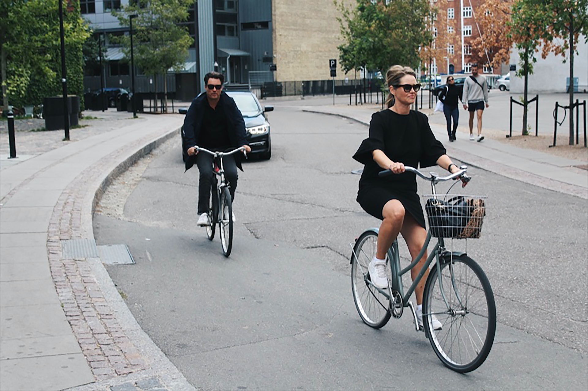 two people cycling