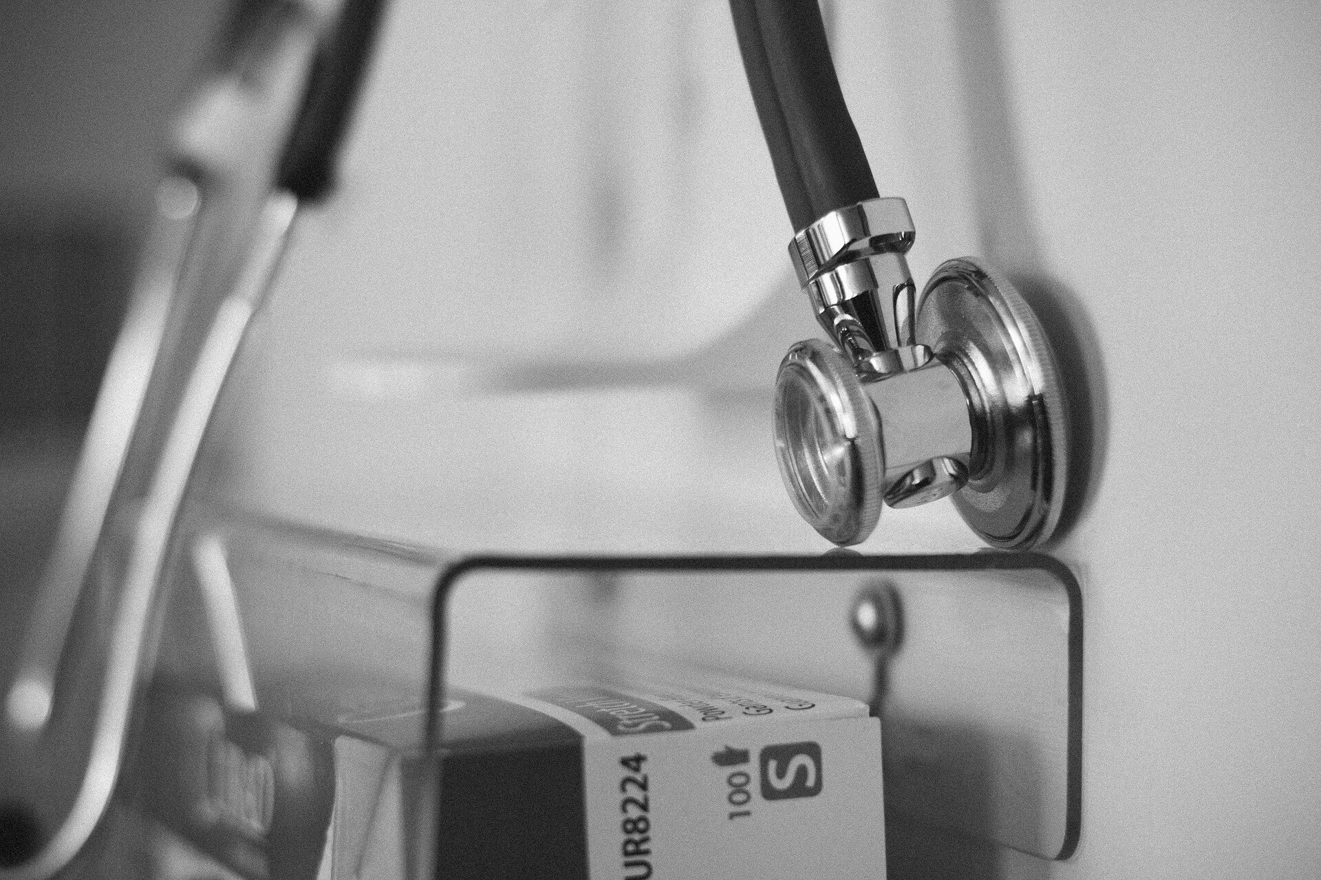 A stethoscope resting against a wall