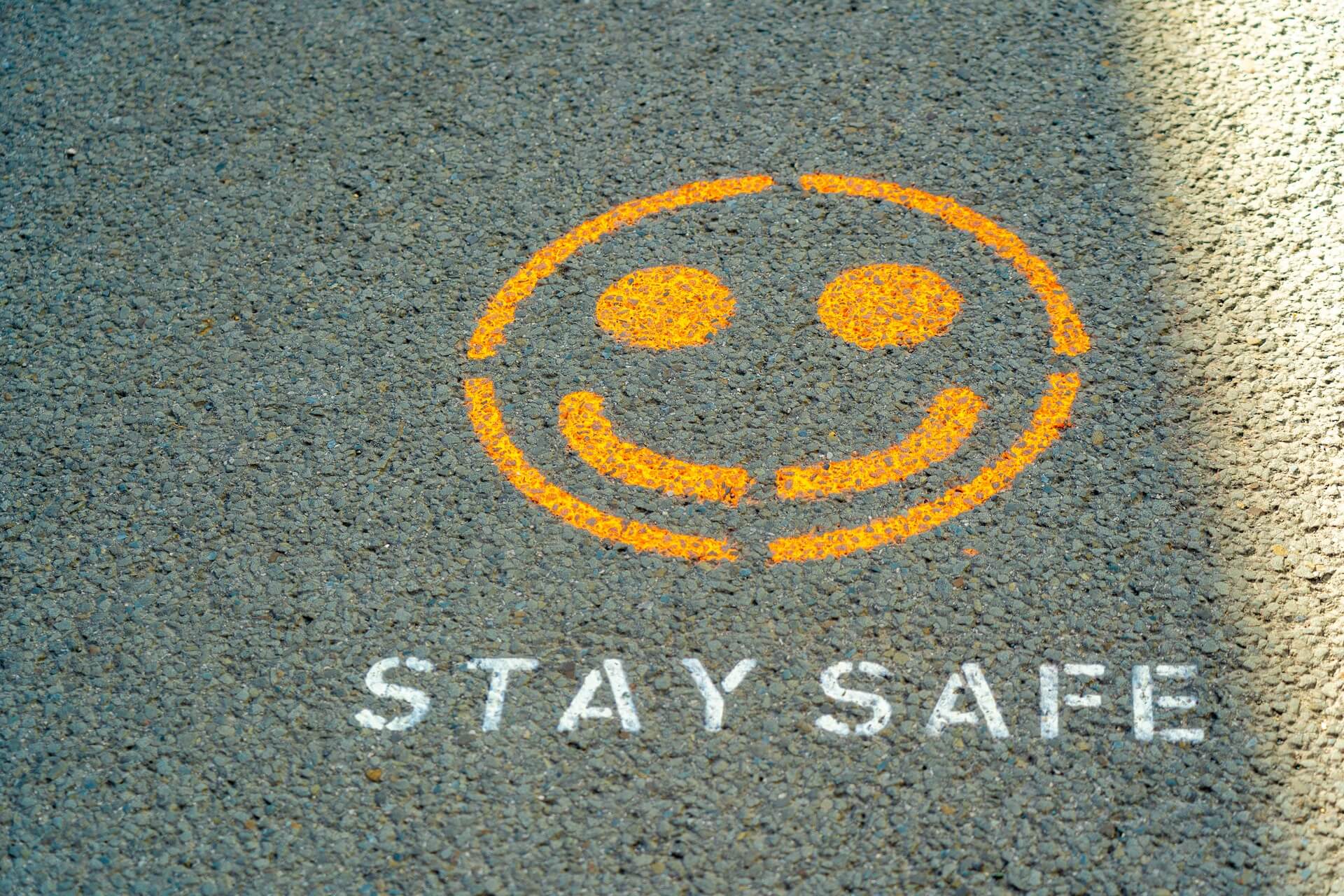 A 'stay safe' sign on the road