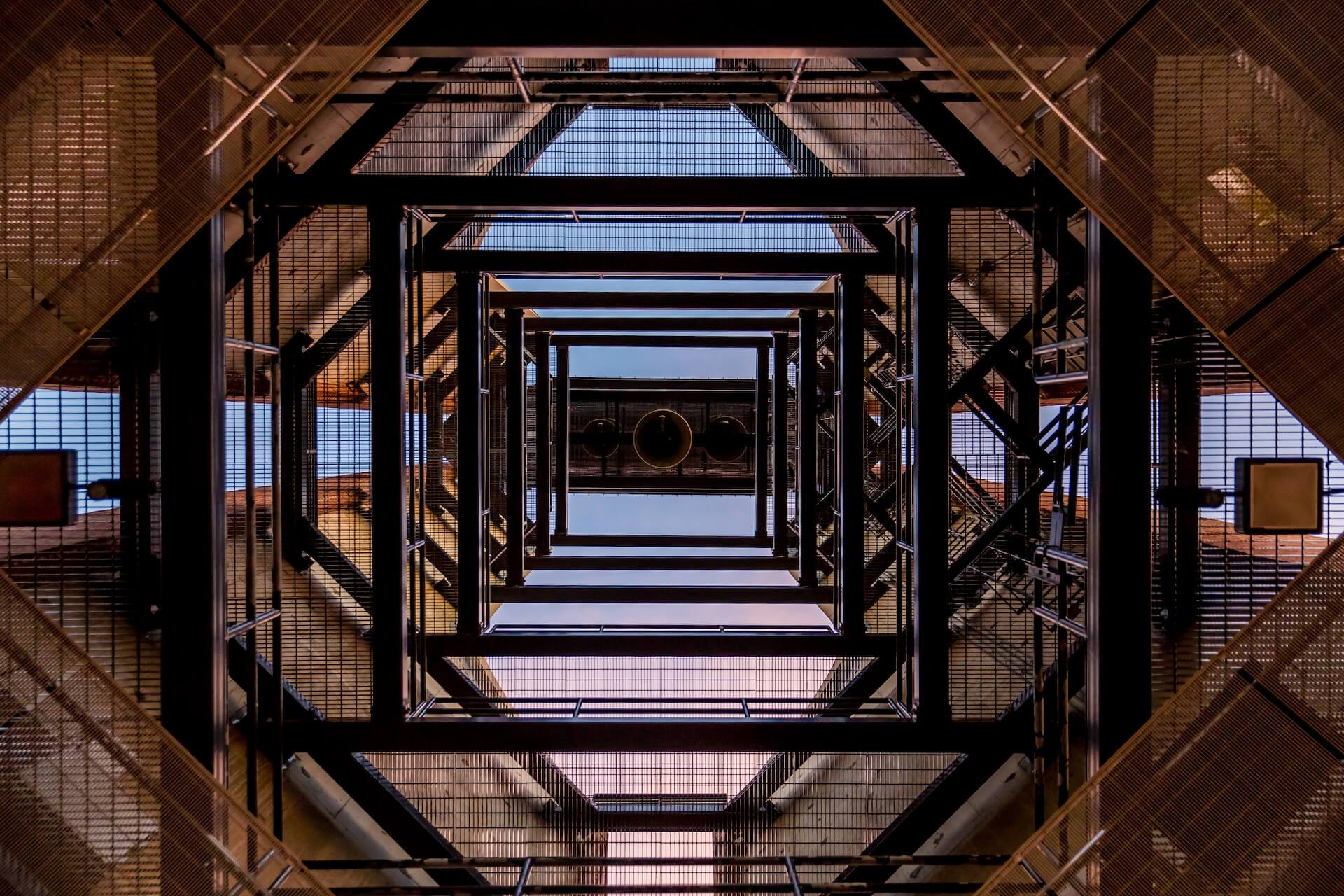 Looking up on the inside of a construction site