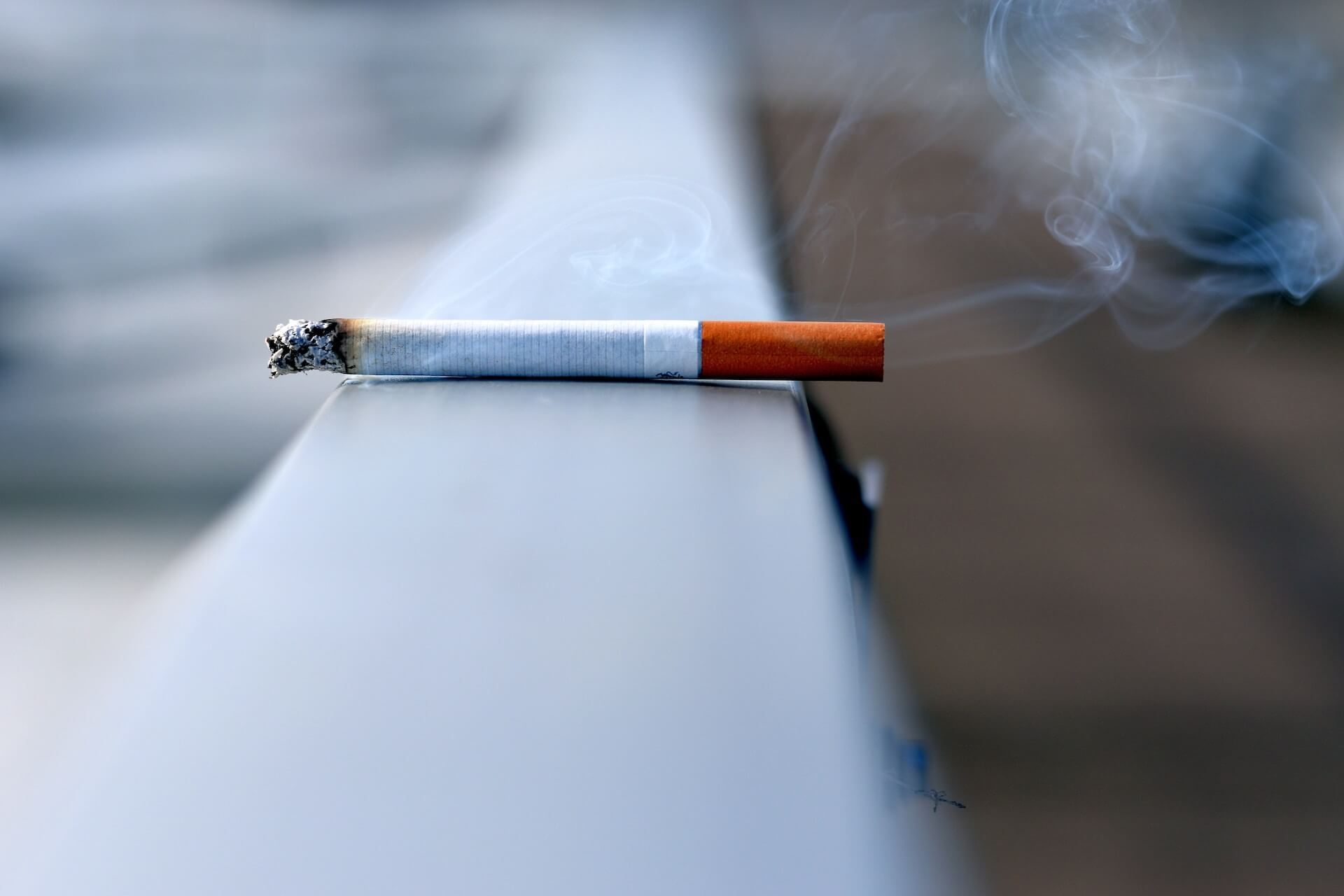 a cigarette on a balcony